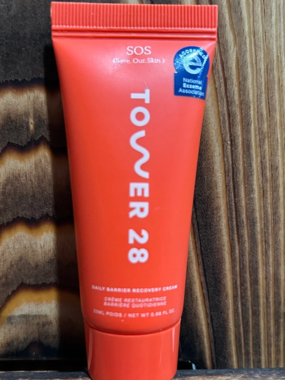 Tower 28 SOS Face Guard SPF 30 in bright red tube